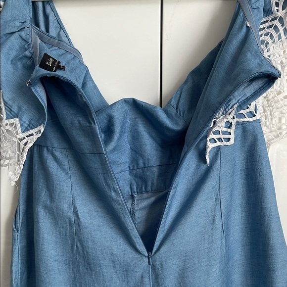 REVOLVE BARDOT Runaway Romper in Sky Blue Chambray with embroidered detail. - Picture 10 of 13